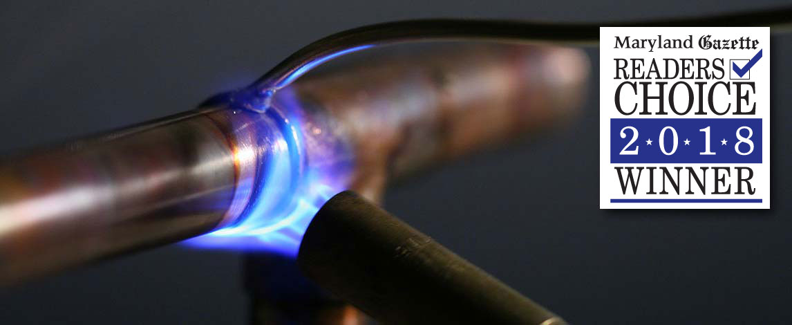 Photograph of sweating copper pipe